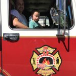 girl in the fire truck